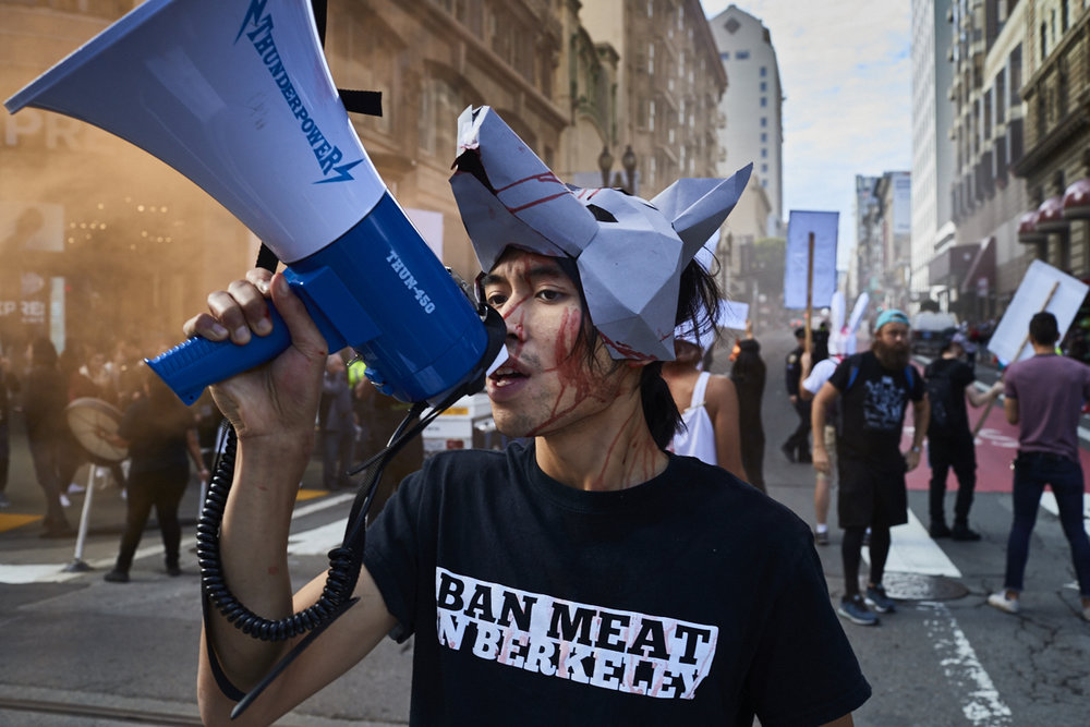 'Ban meat in Berkeley' activist with a megaphone